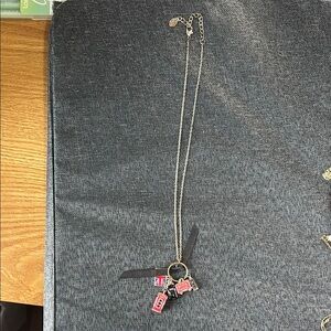 Silver Charm Necklace with UK Carms